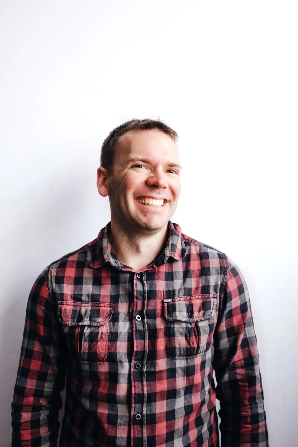 Joel Warren, founder of Tradieboost, smiling.